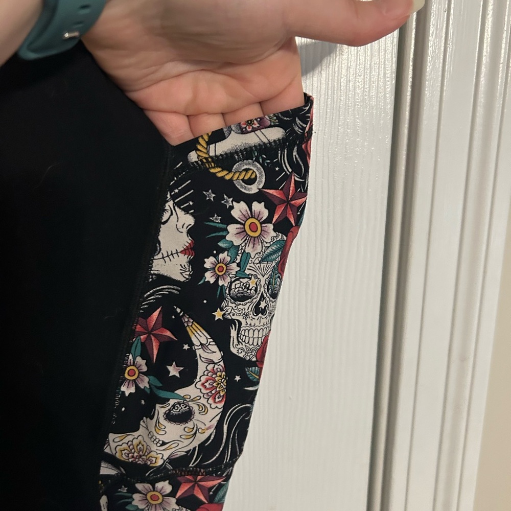 Torrid Black Leggings with Colorful Skull Print